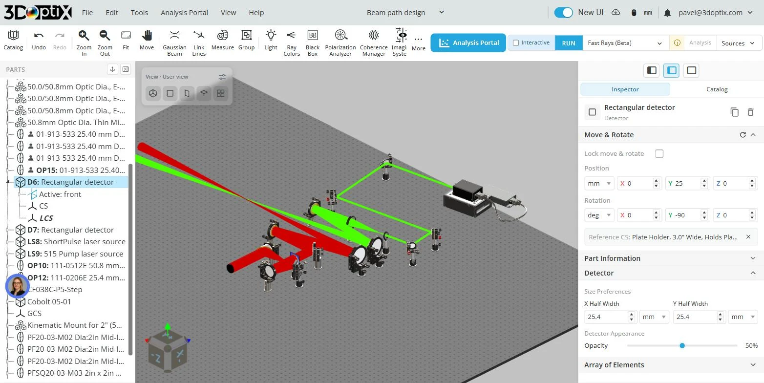 The 3DOptix editor: top menu bar and header toolbar, the PARTS tree on the left, the 3D viewport with a beam path on an optical breadboard, and the Inspector panel on the right showing a selected detector